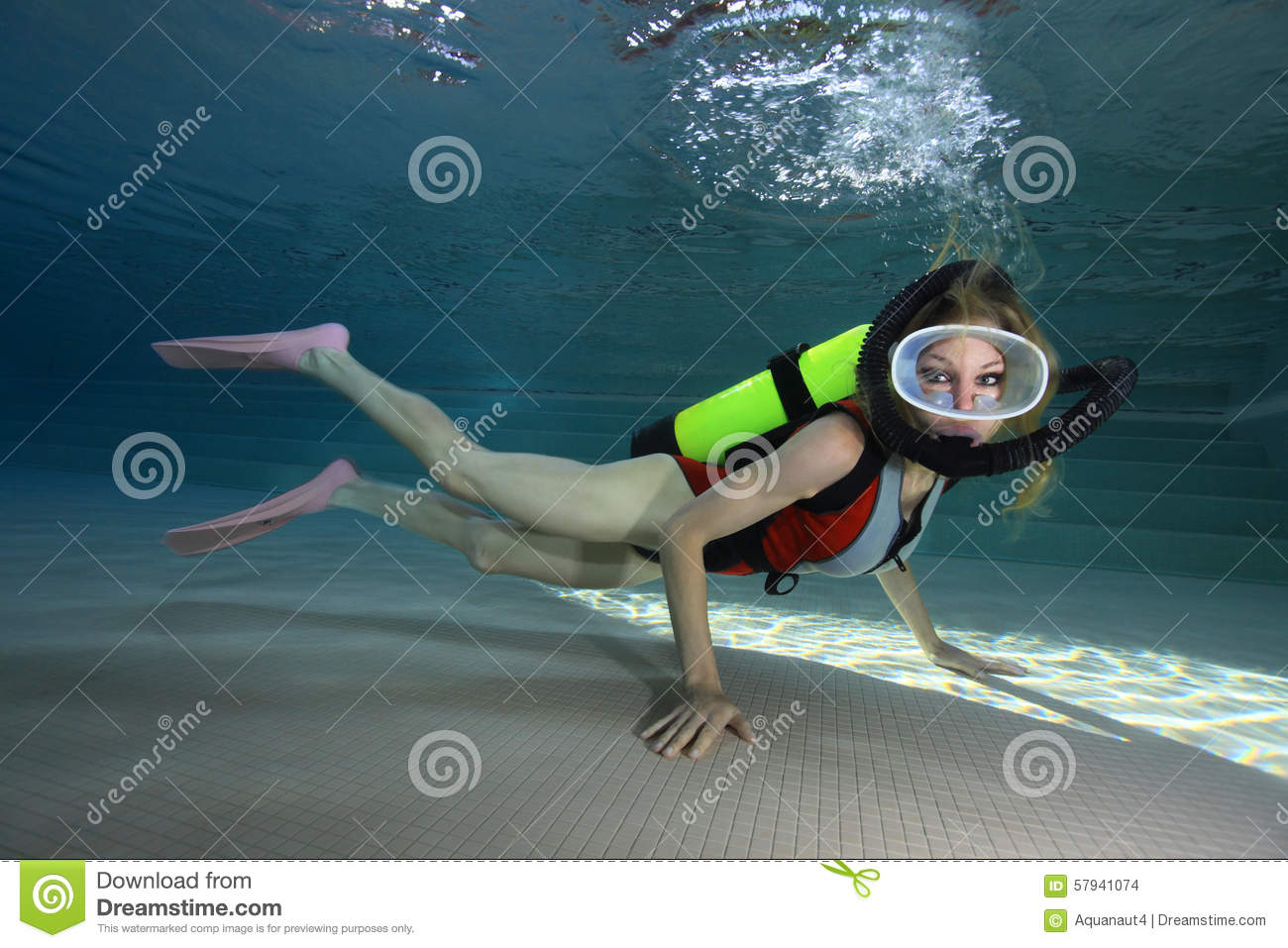 Female Scuba Diver With Neoprene Swimsuit Diving Underwater In The
