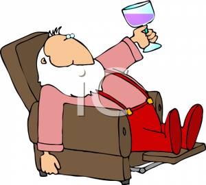 Santa Claus Relaxing In His Recliner Holding Up A Glass Of Wine