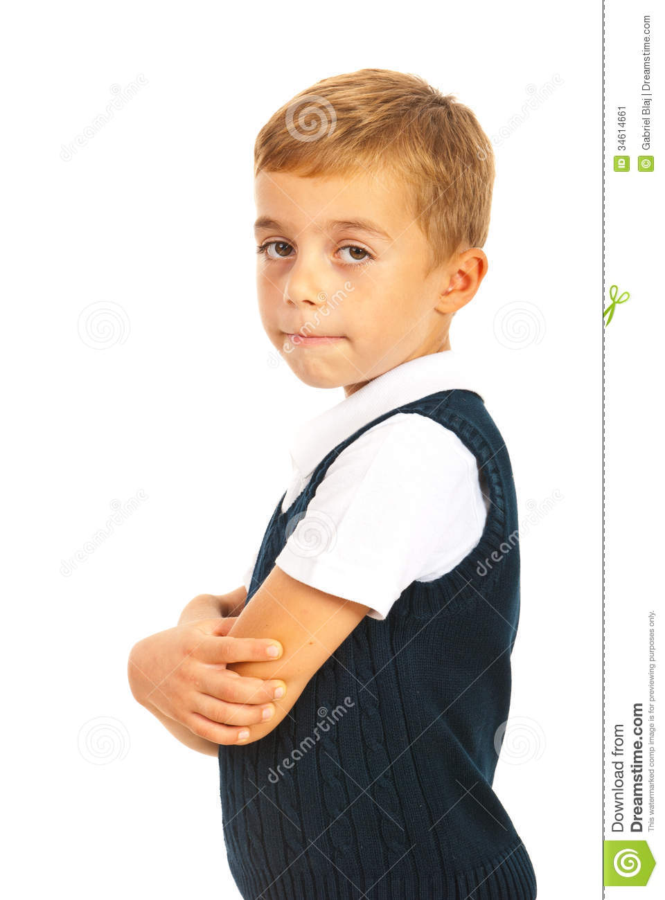 School Boy Standing With Arms Folded In Semi Profile Isolated On White