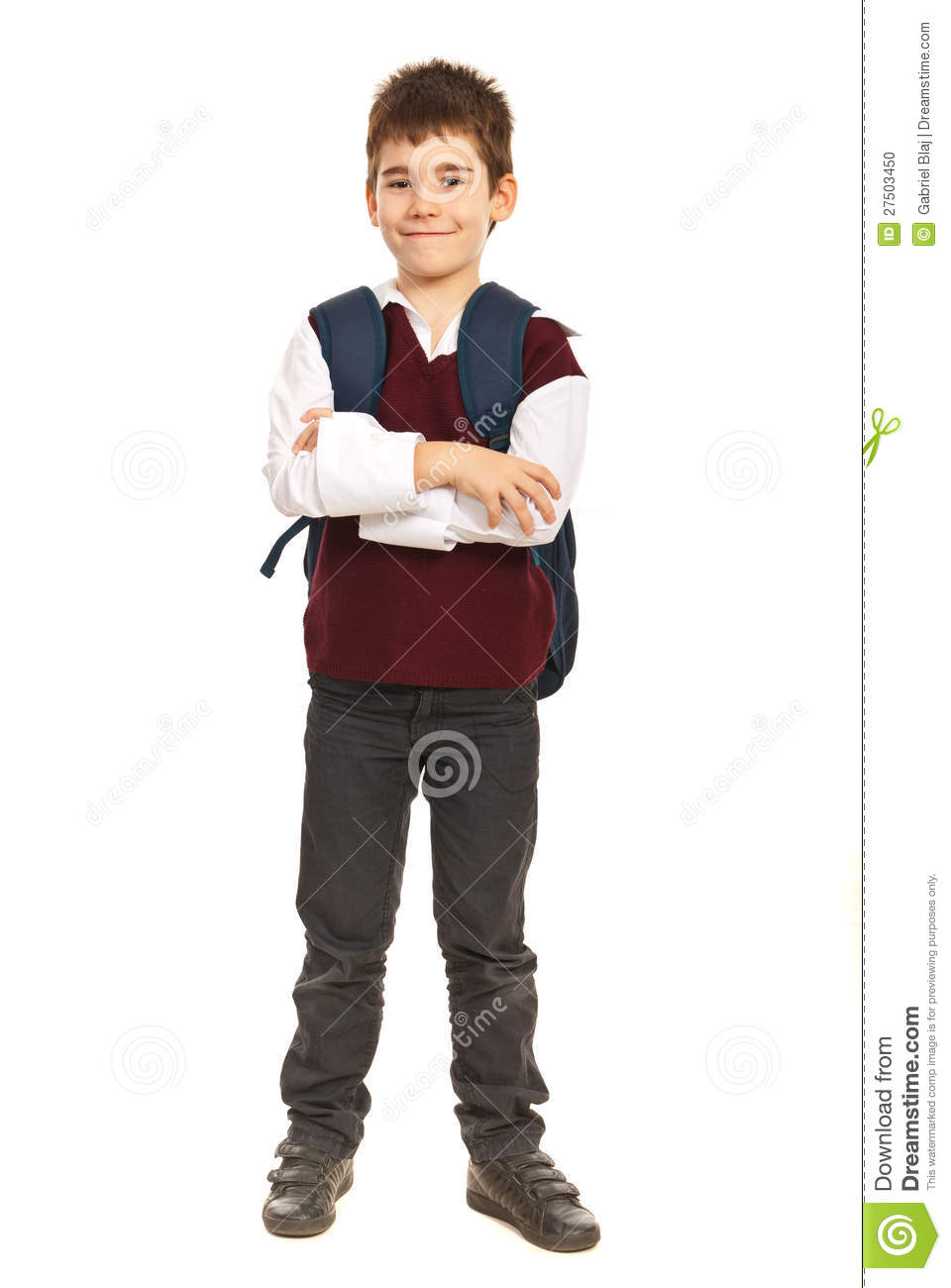 Student Boy At Primary School With Back Bag Standing With Arms Folded