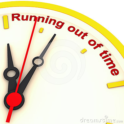 Running Out Of Time Written On A Wall Clock Frame With Needles Coming