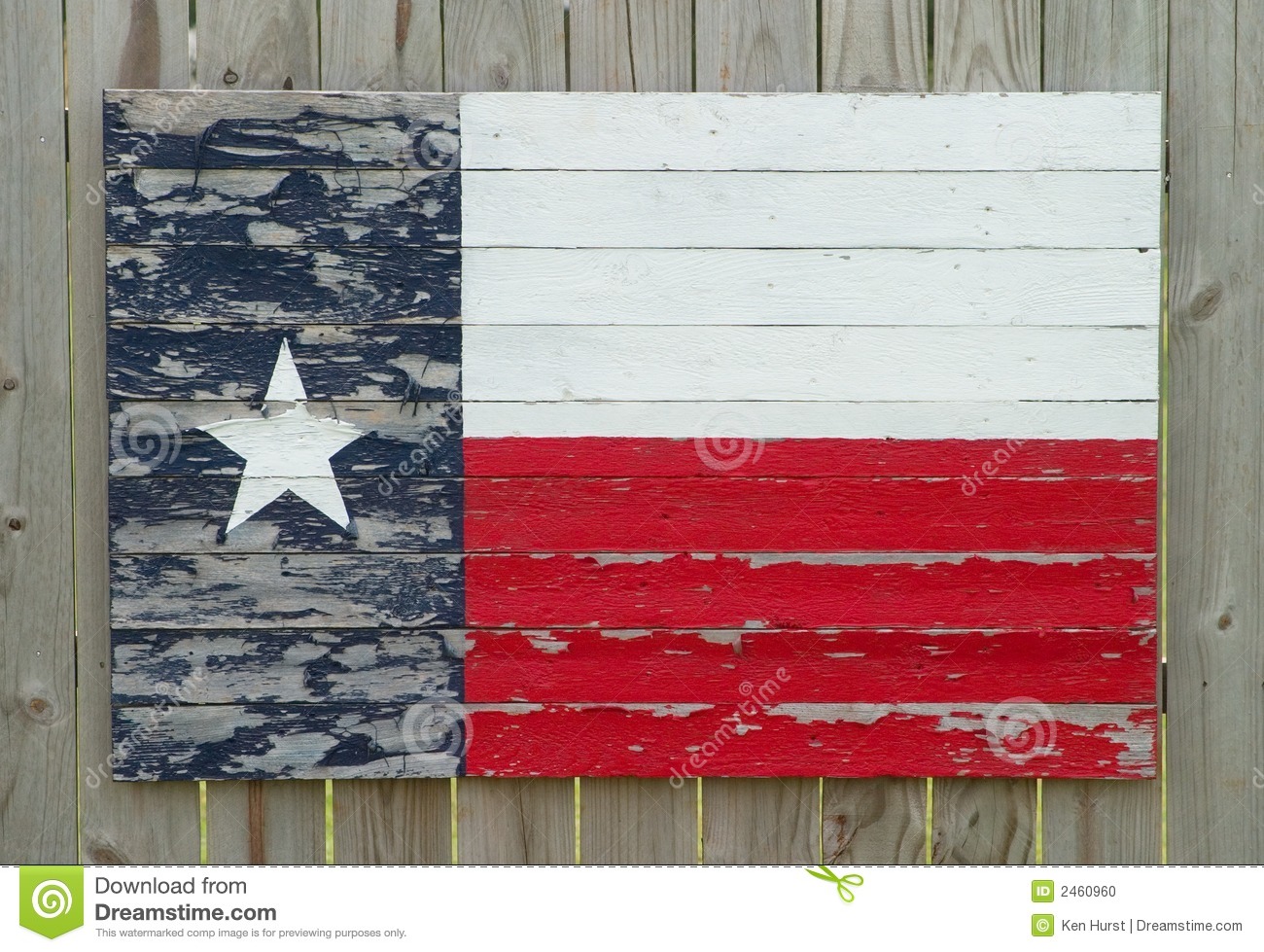 Old Rustic Texas Flag Painted Onto Wood Slats On A Wood Fence 