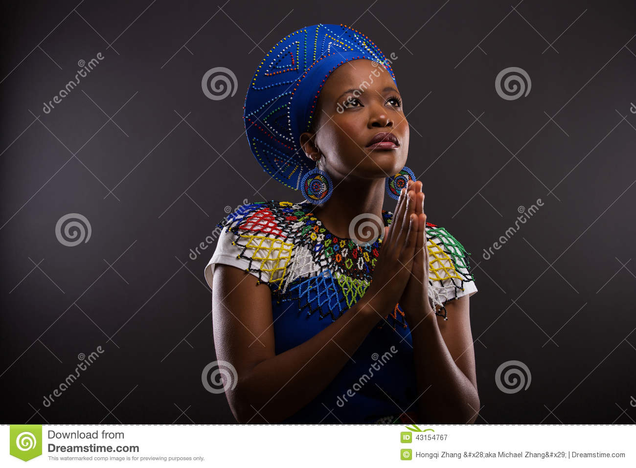 Religious Young African Woman Praying Over Black Background