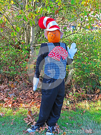 Scarecrow With A Checkered Vest Polka Dot Bow Tie White Gloves