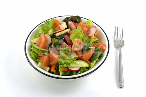 Garden Salad With Balsamic Vinaigrette Dressing Isolated On White