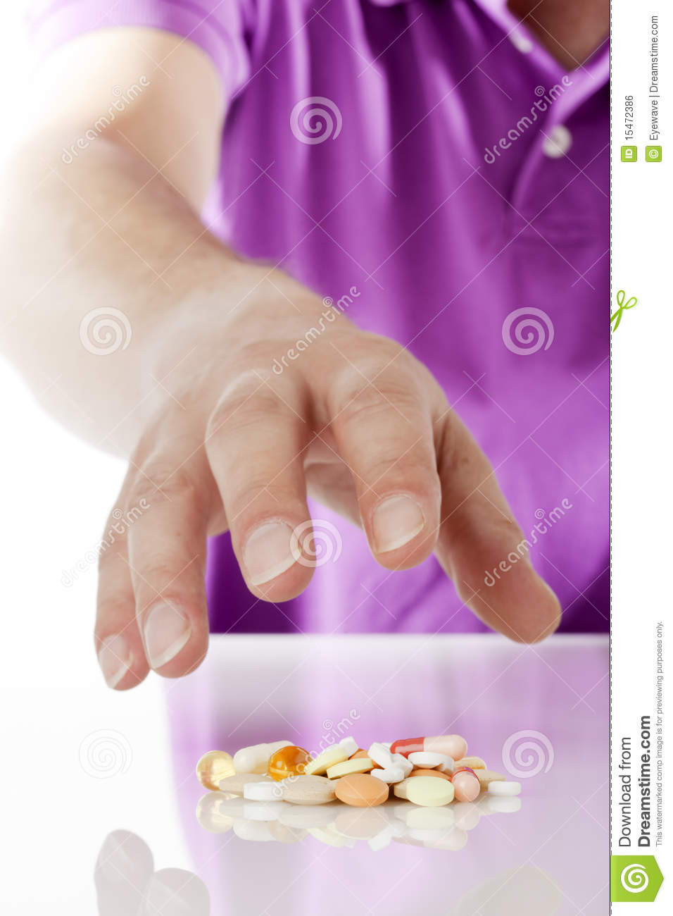 Hand Of Male Caucasian In Purple Polo Shirt Grabbing For A Pile Of