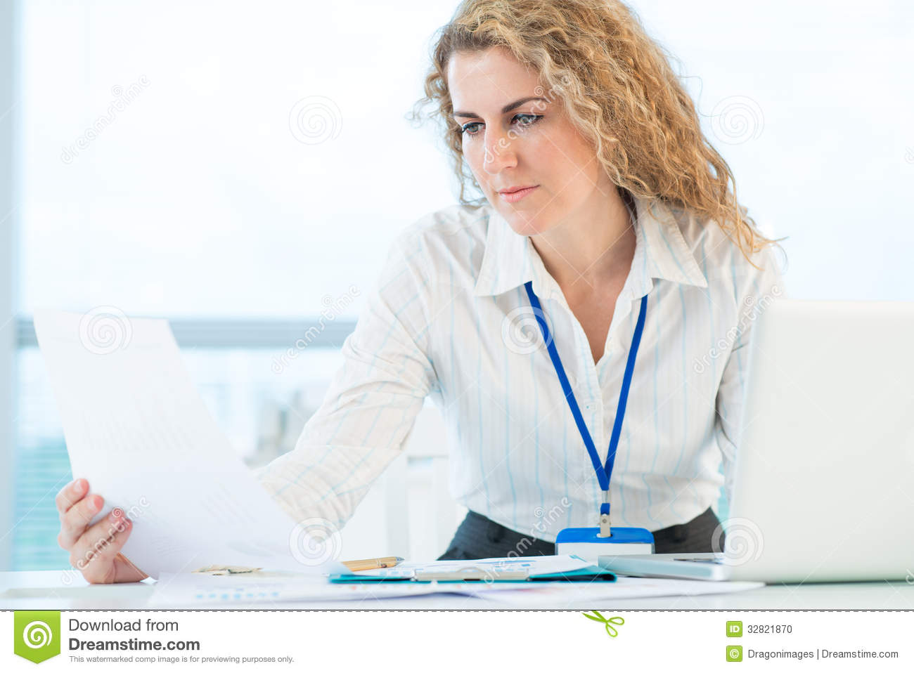 Image Of A Female Office Worker Being Concentrated On An Important    