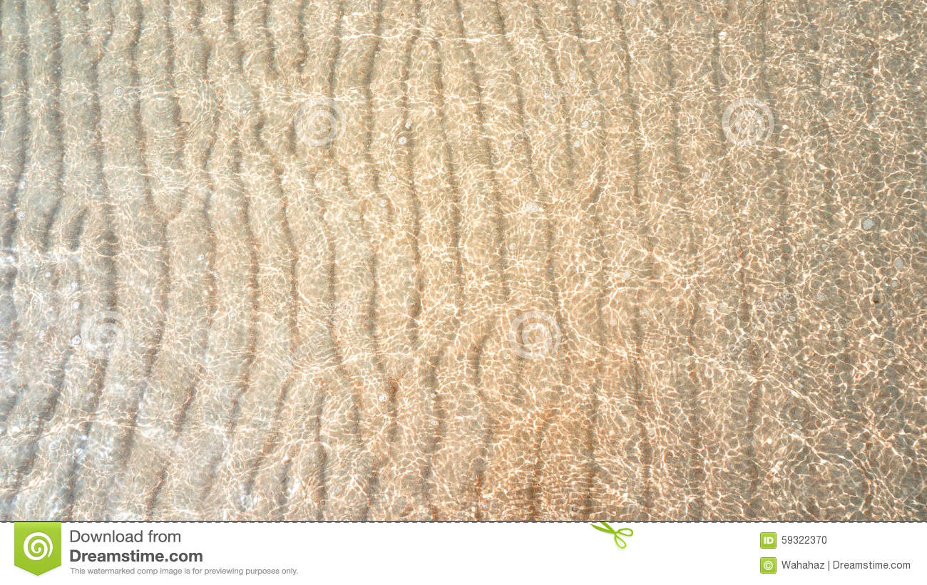 Water Ripple Sand Waves And Sunlight Glare  Sea Floor Background