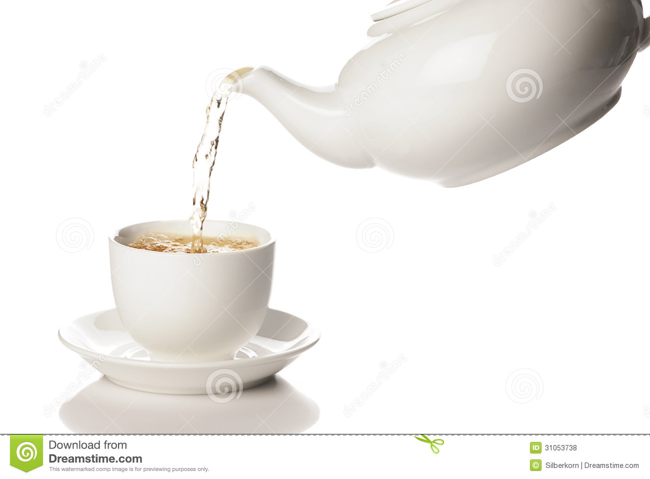 Pouring Green Tea From A White Teapot Into A Mug Royalty Free Stock