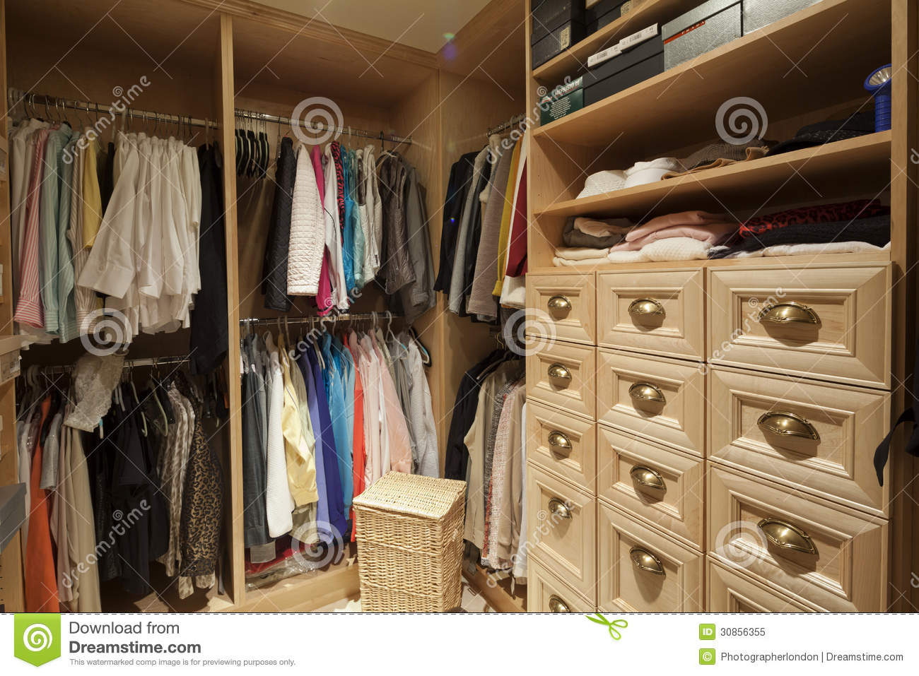 Walk In Closet With Organized Clothing Royalty Free Stock Photo