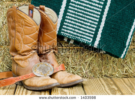Pair Of Worn Boots Belt And Buckle Horse Blanket And Bale Of Hay