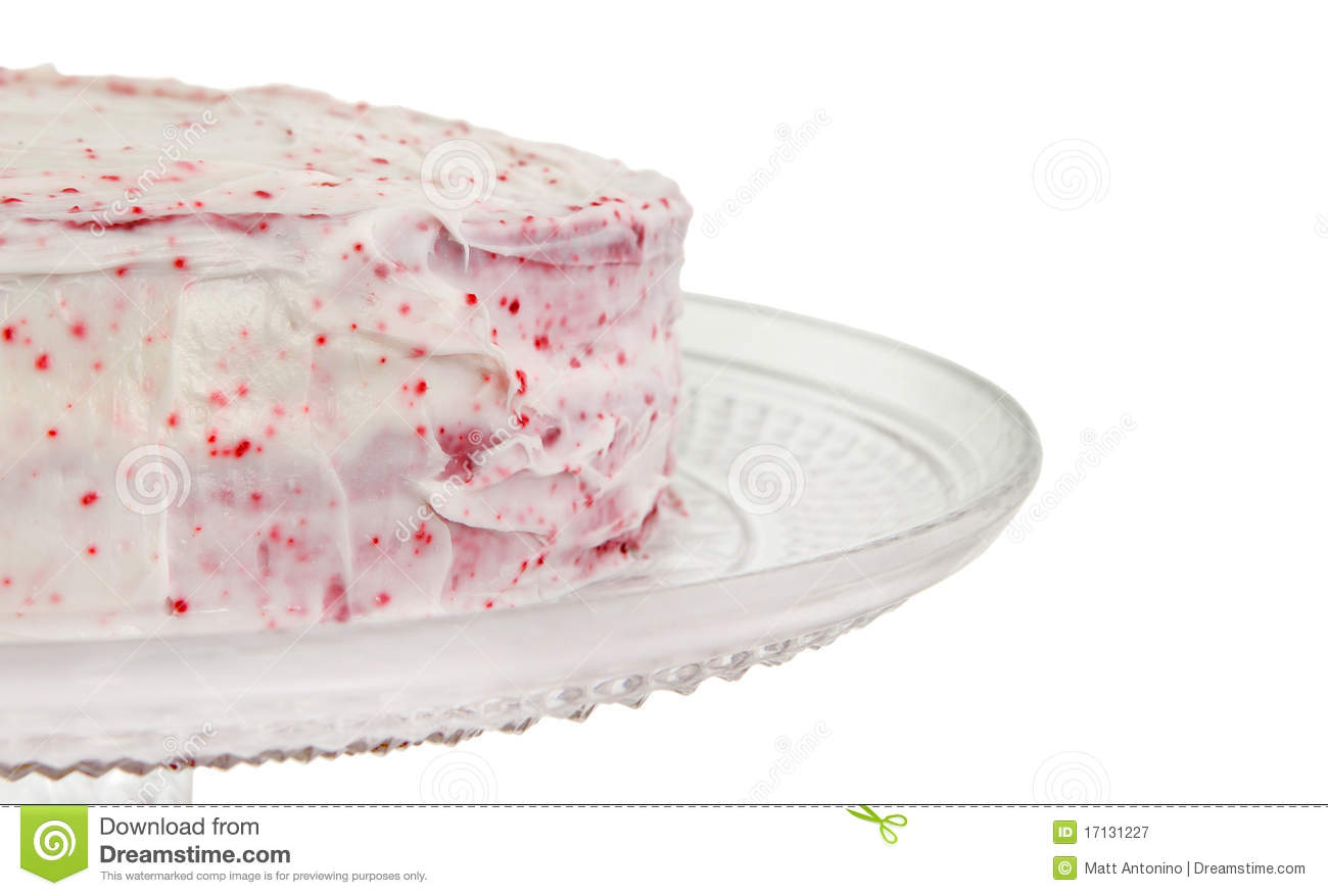 Half A Red Velvet Cake Frosted With Pink Frosting Isolated Over White    