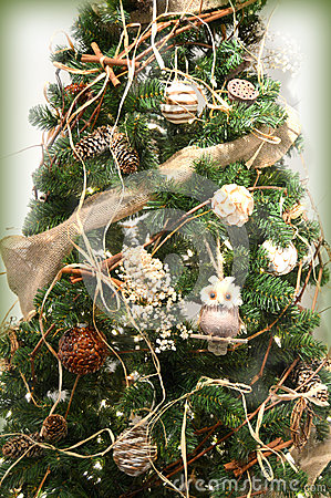 Rustic Christmas Tree Decorated With Owls Pinecones Ribbon