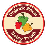 Round Dairy Fresh And Organic Farm Logo With Bell Peppers Stock
