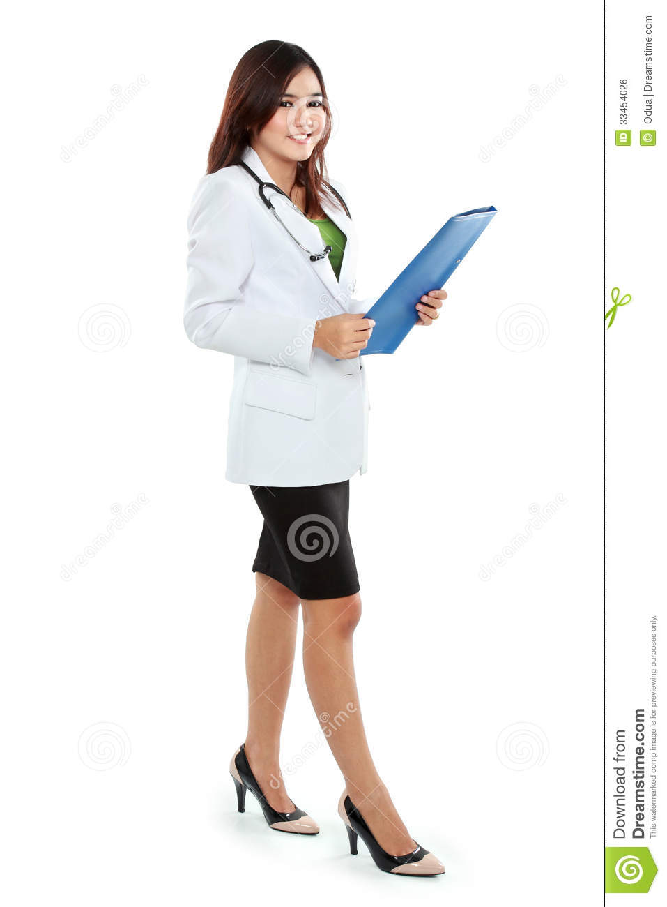Attractive Female Doctor In Lab Coat Holding Clipboard Isolated Over