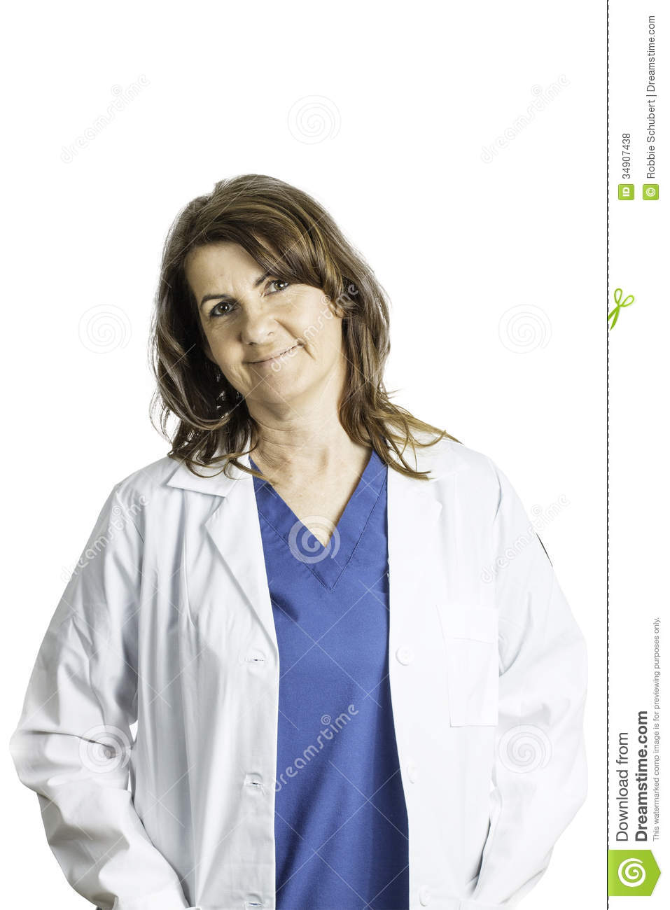 Female Doctor Wearing Blue Scrubs And A Lab Coat Isolated On A White