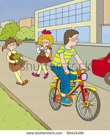 Boy On Bike Rides Quickly Along The Sidewalk Correct  Stock Photo    