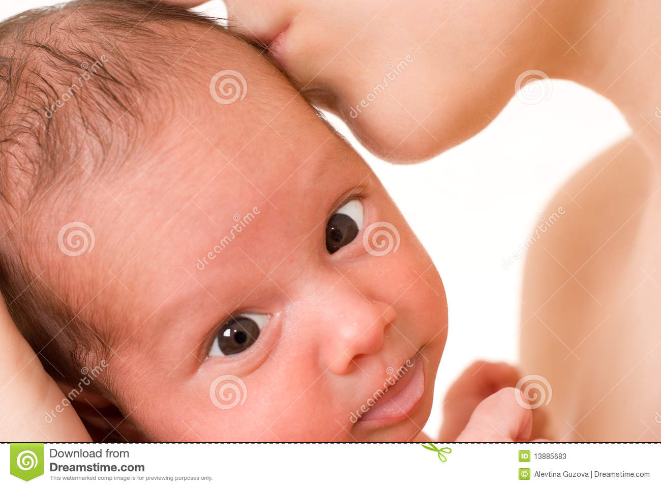 Mother Holds Baby With Brown Eyes Stock Photos   Image  13885683