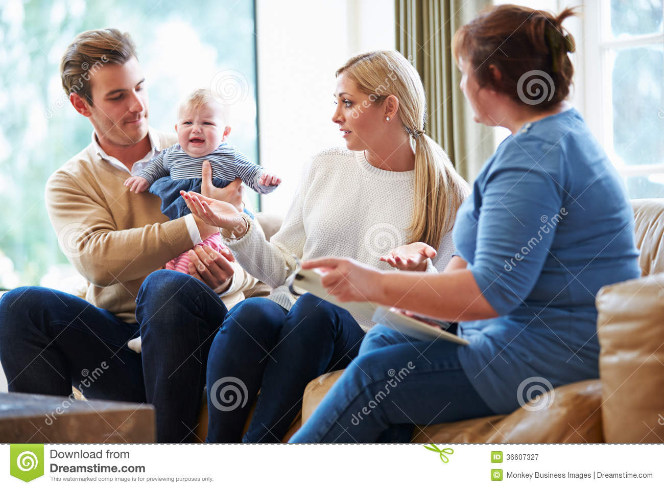 Social Worker Visiting Family With Young Baby Royalty Free Stock