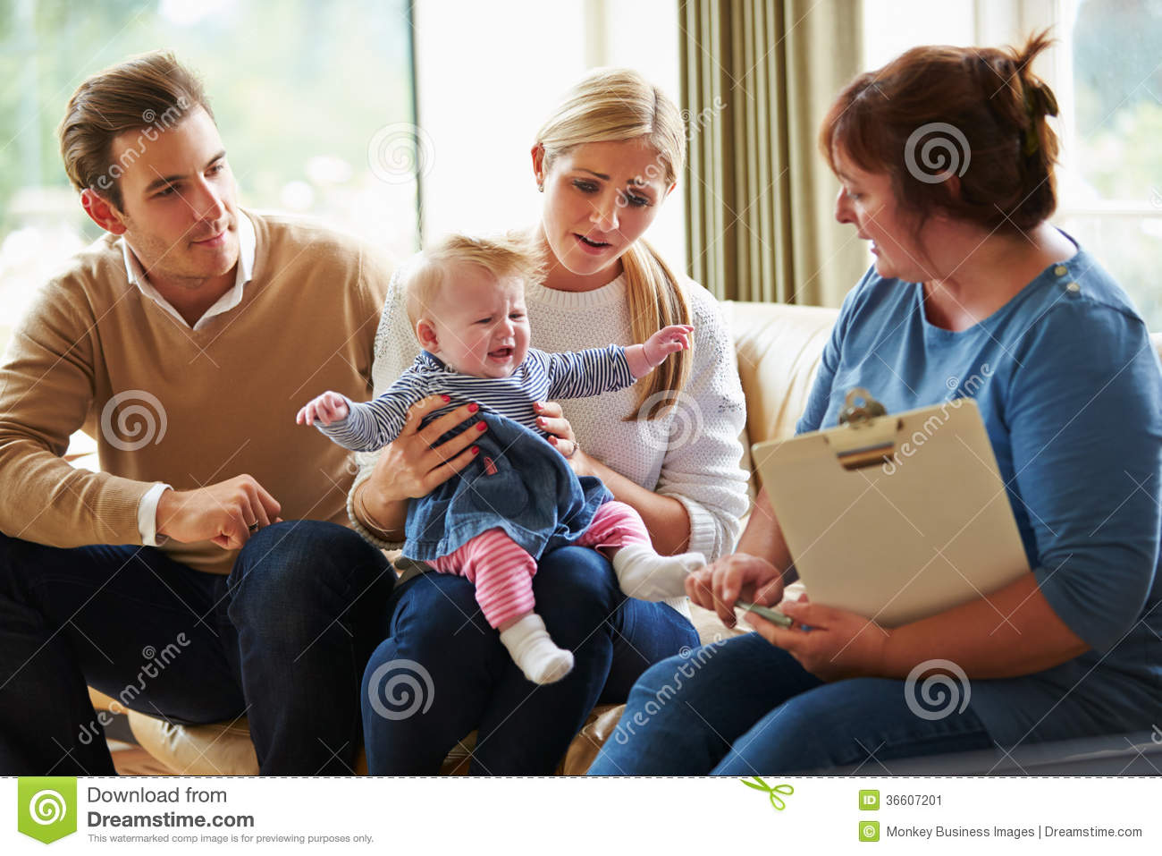 Social Worker Visiting Family With Young Baby Stock Image   Image