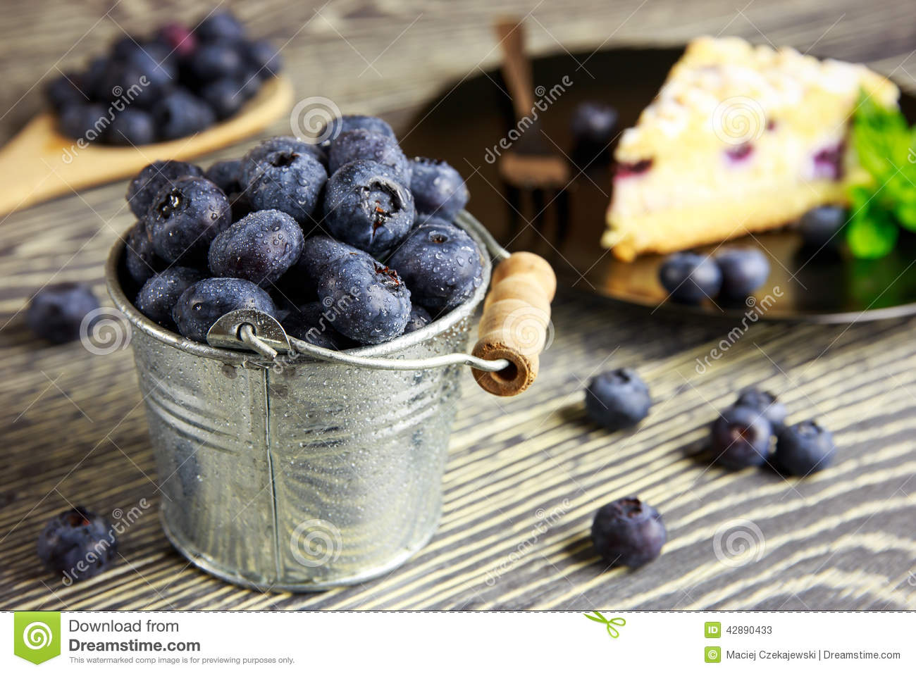 Blueberry Cake And Fresh Fruits Arranged On A Wooden Table