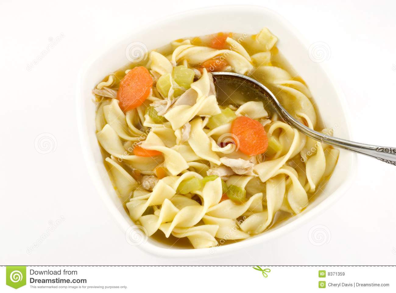 Bowl Of Homemade Chicken Noodle Soup In White Bowl Isolated On White