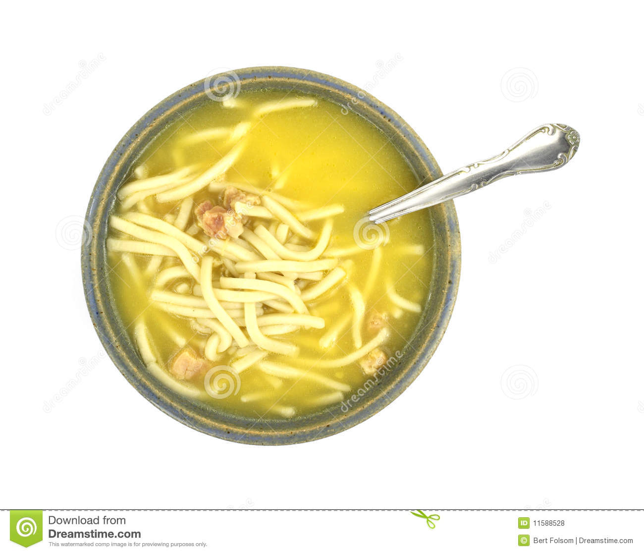Serving Of Chicken Noodle Soup In A Colorful Dish With Spoon Against