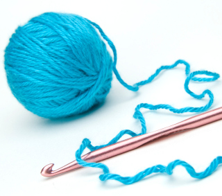 Crochet Hook And Ball Of Yarn