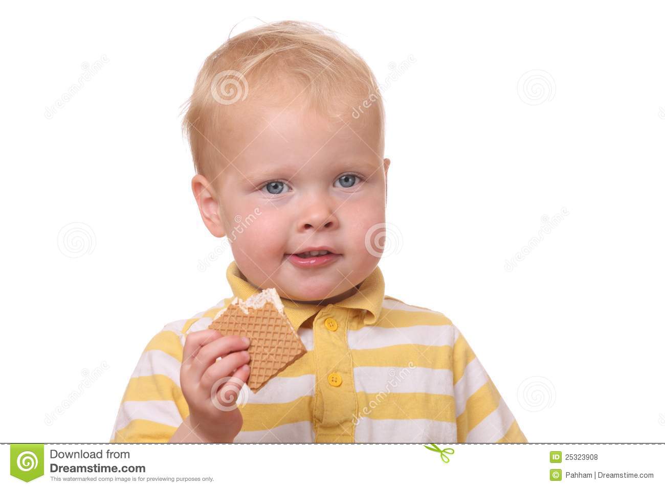 Portrait Of A Young Kid Eating Cookies On White Background