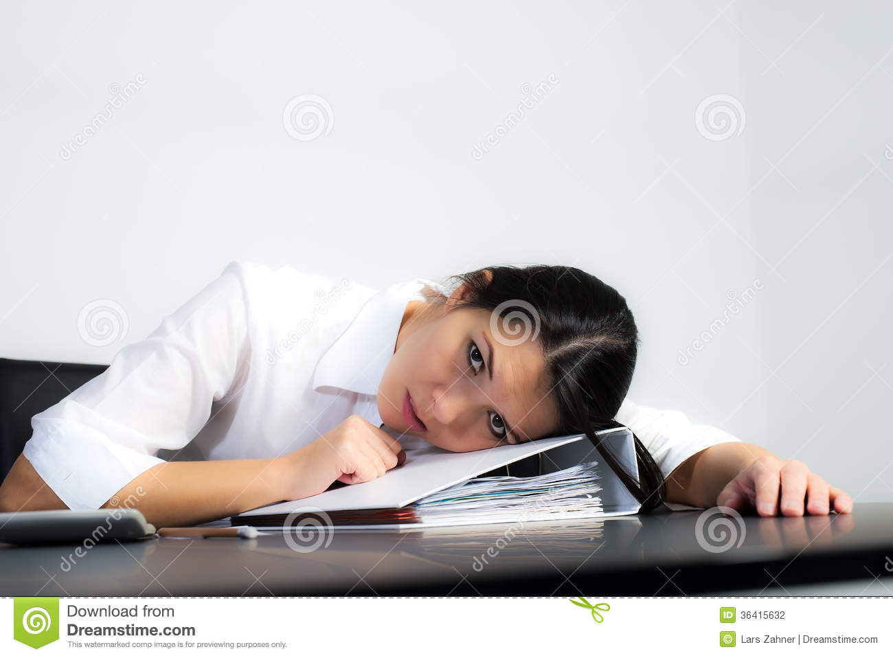 Exhausted Depressed Businesswoman Or Student Sitting At Her Desk Lying    