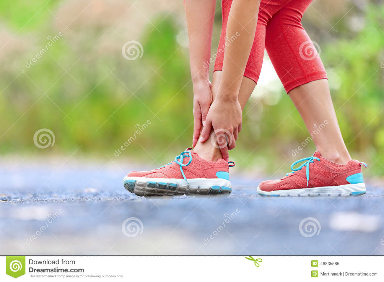 Twisted Broken Ankle   Running Sport Injury  Female Runner Touching    