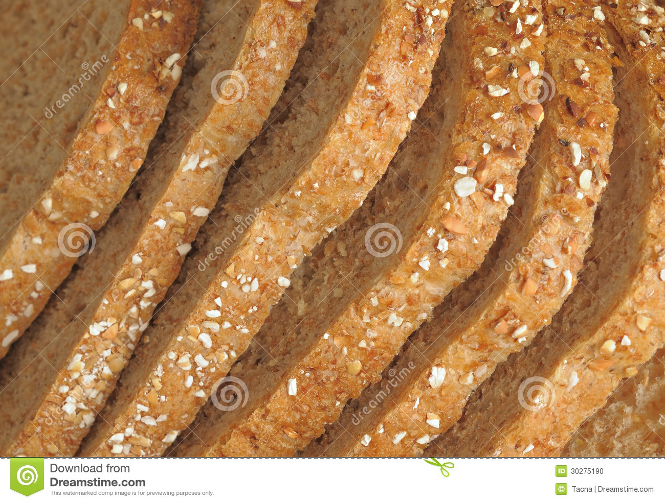 Slices Of Fresh Black Whole Grain Bread With Visible White Seeds