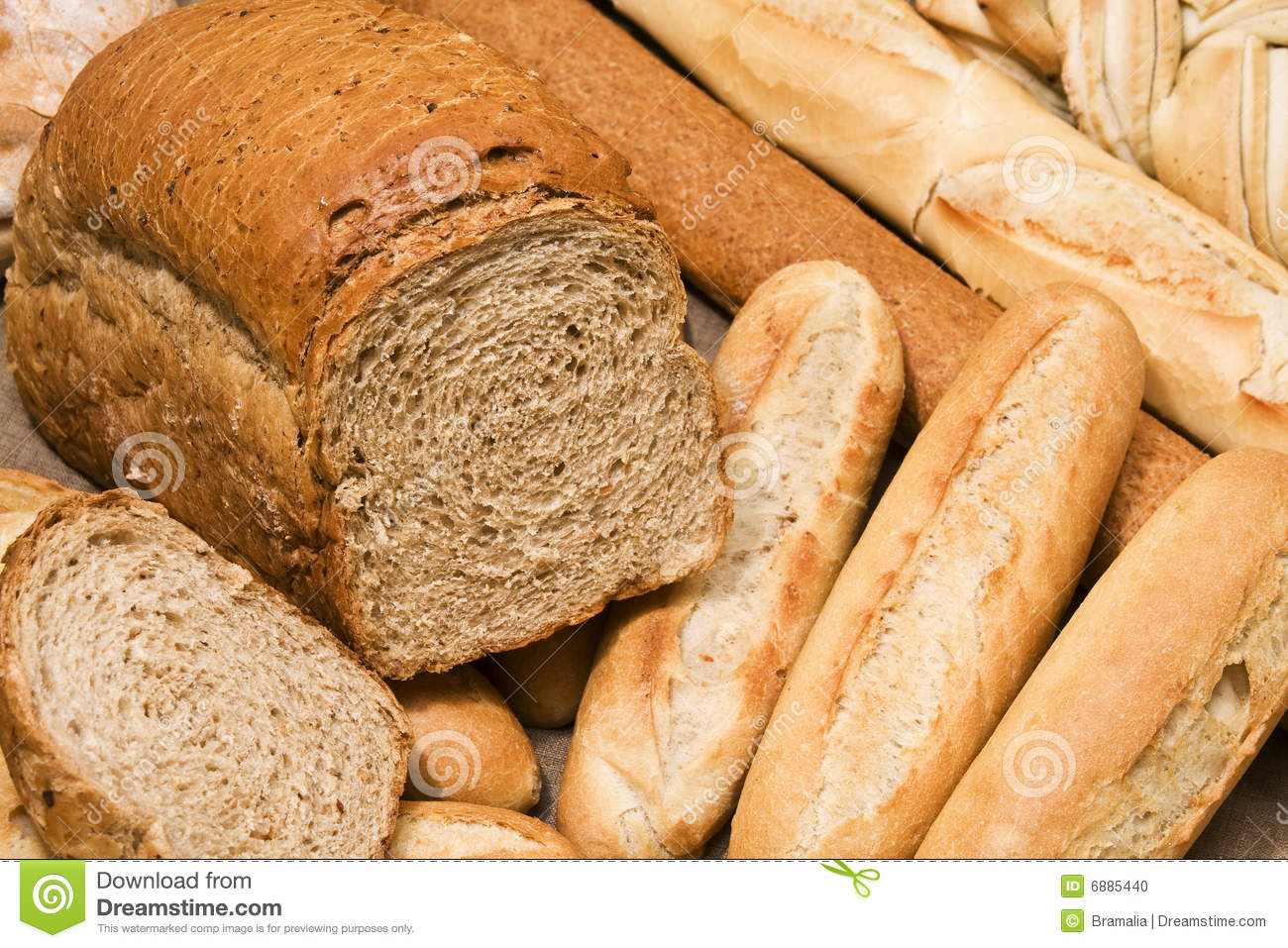 Up Of A Sliced Whole Grain Bread And Baguettes  Focus On Brown Bread