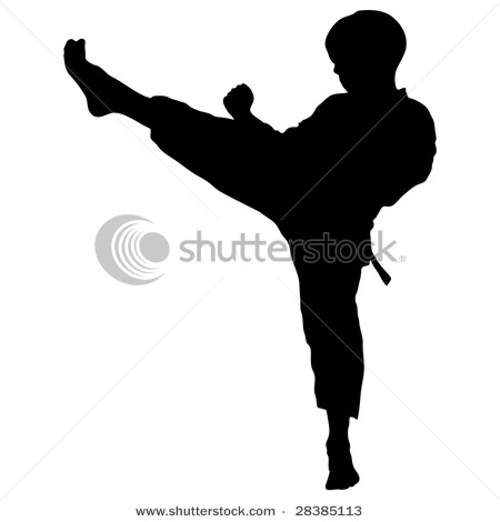 Silhouette Of A Boy Child Practicing Karate With A High Leg Kick In A