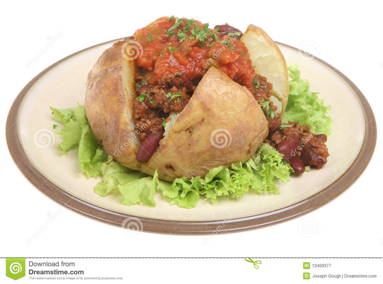 Baked Potato Filled With Chilli Con Carne And Tomato Salsa