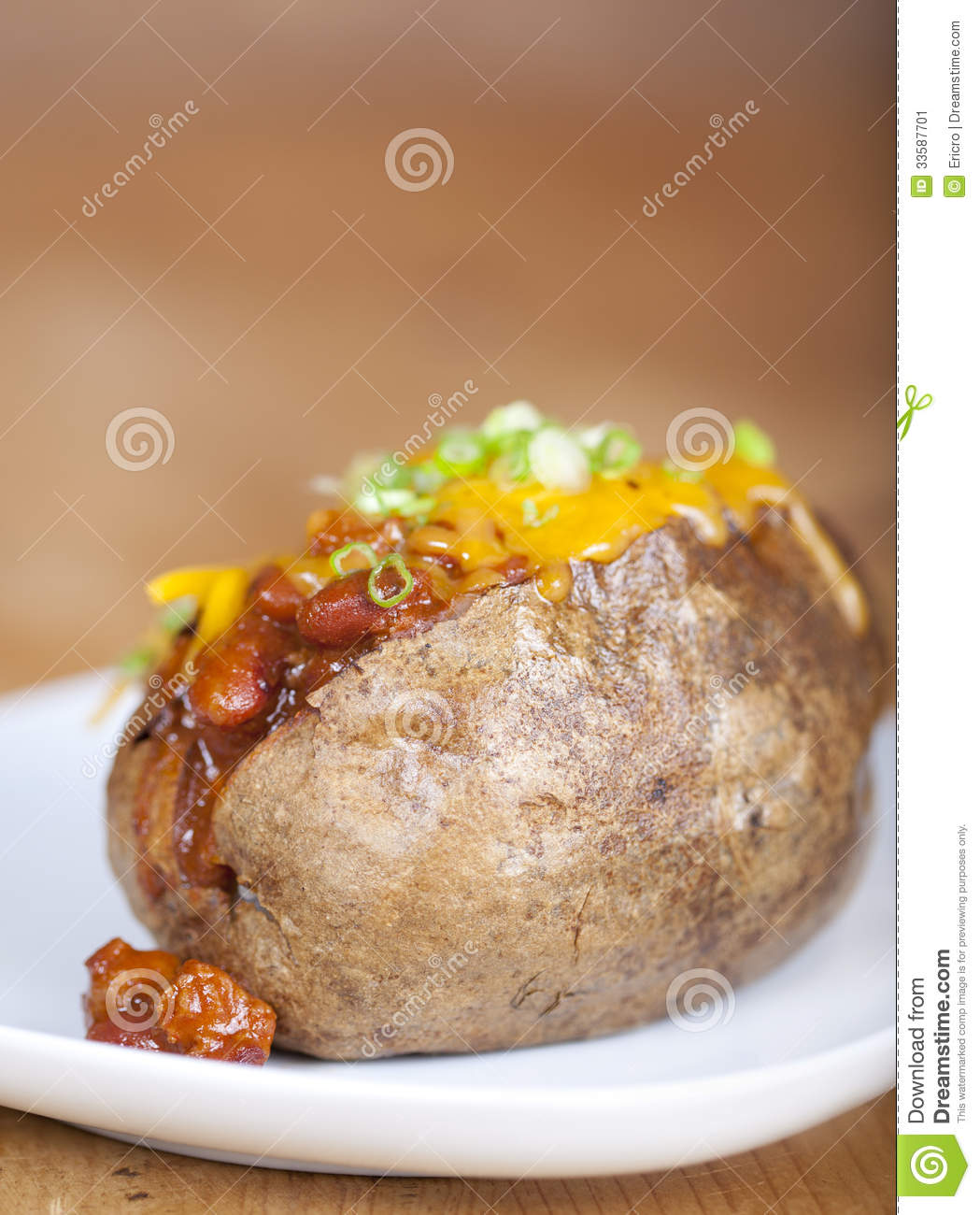Loaded Baked Potato With Chili And Cheese On A Plate Stock Image    