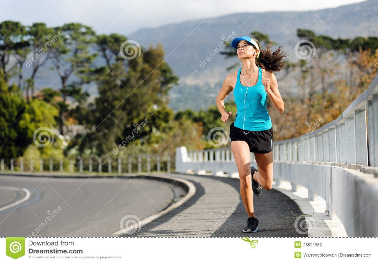 Endurance Athlete Training On Sidewalk Running Fitness Marathon Woman