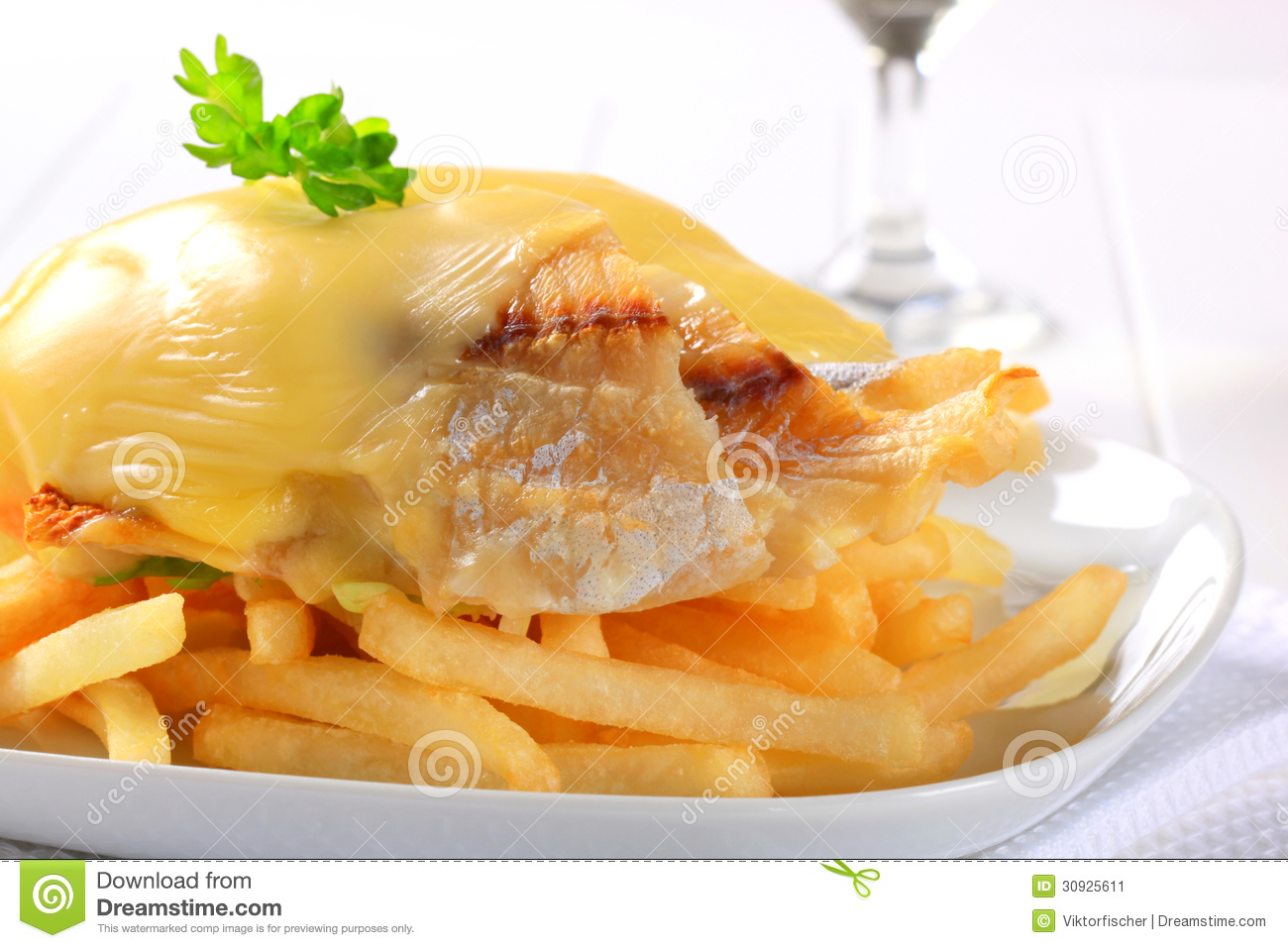 Cheese Topped Fish Fillets With French Fries Stock Image   Image
