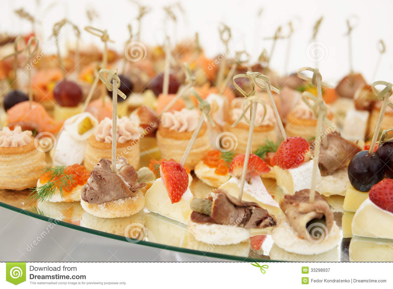 Small Fish Meat And Cheese Snacks In Plate On Banquet Table Close Up 