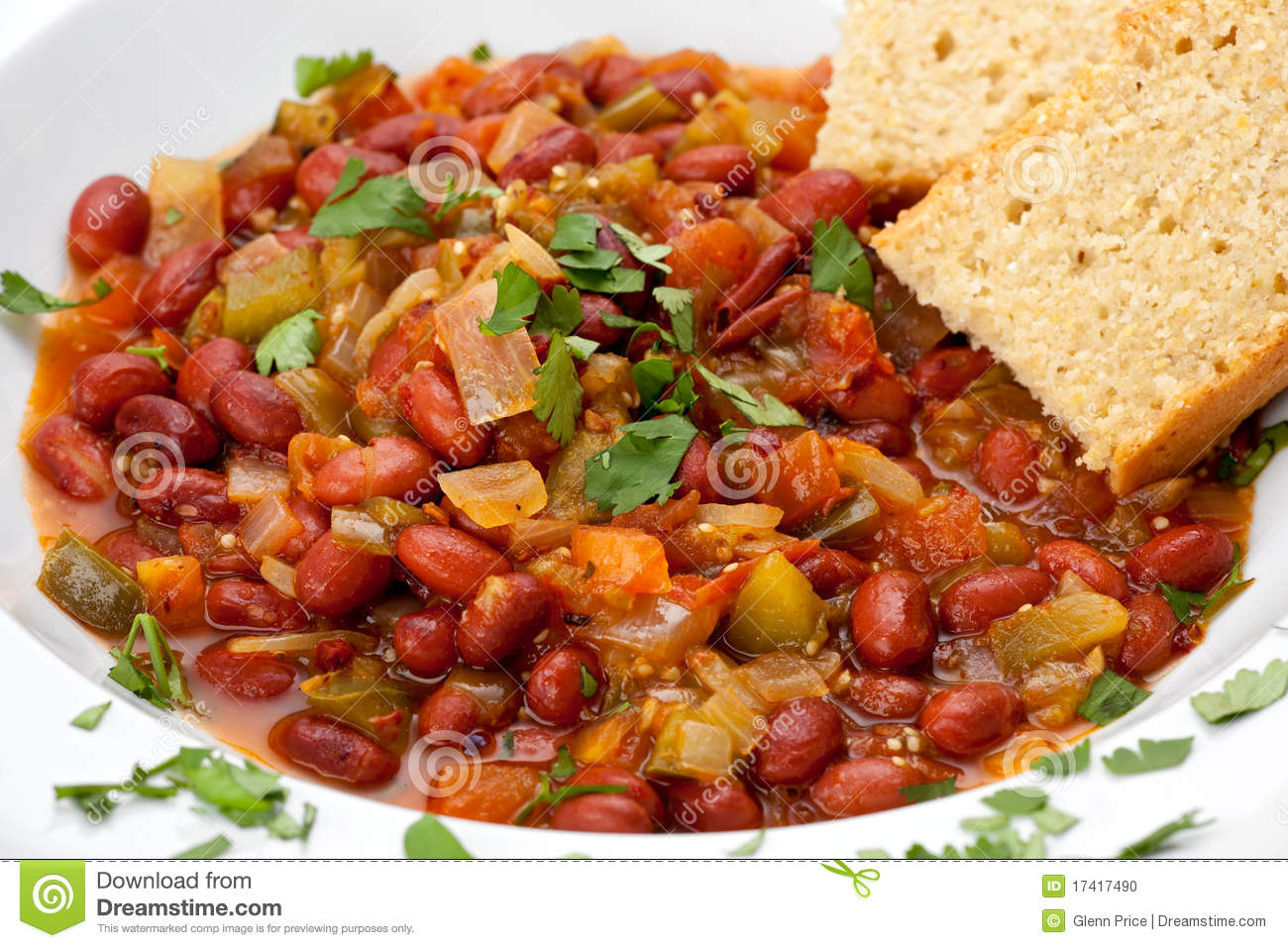 Up Of Vegetarian Chili With Beans And Cornbread In A White Bowl
