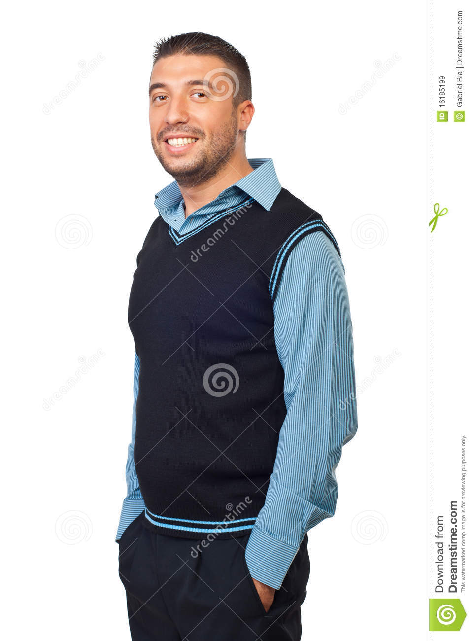 Casual Business Man Standing With Hands In Pockets And Smiling    