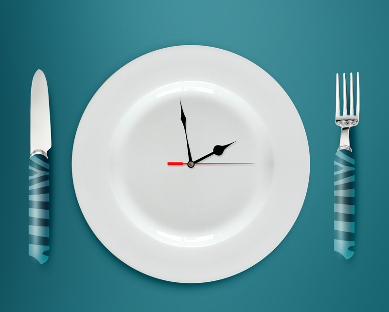 Lunch Time Concept Clock In Plate Knife And Fork