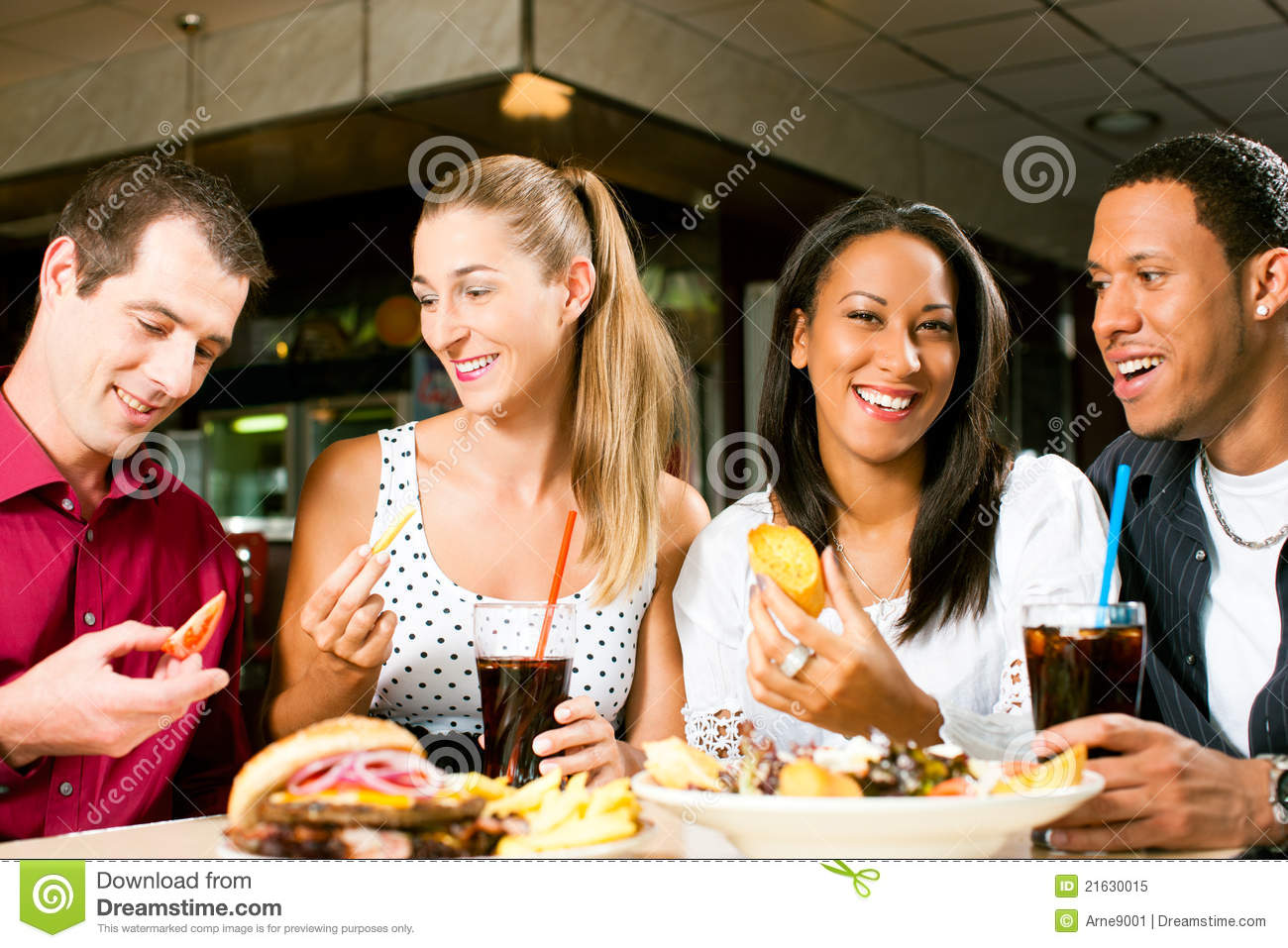 Friends Eating Hamburger And Drinking Soda Royalty Free Stock Photo    