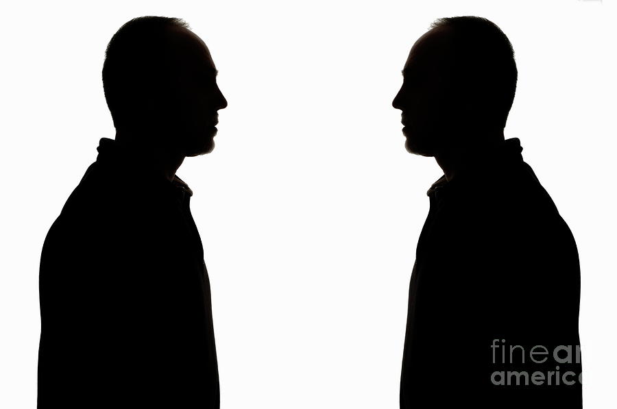 Silhouette Of Two Men Face To Face Photograph By Sami Sarkis