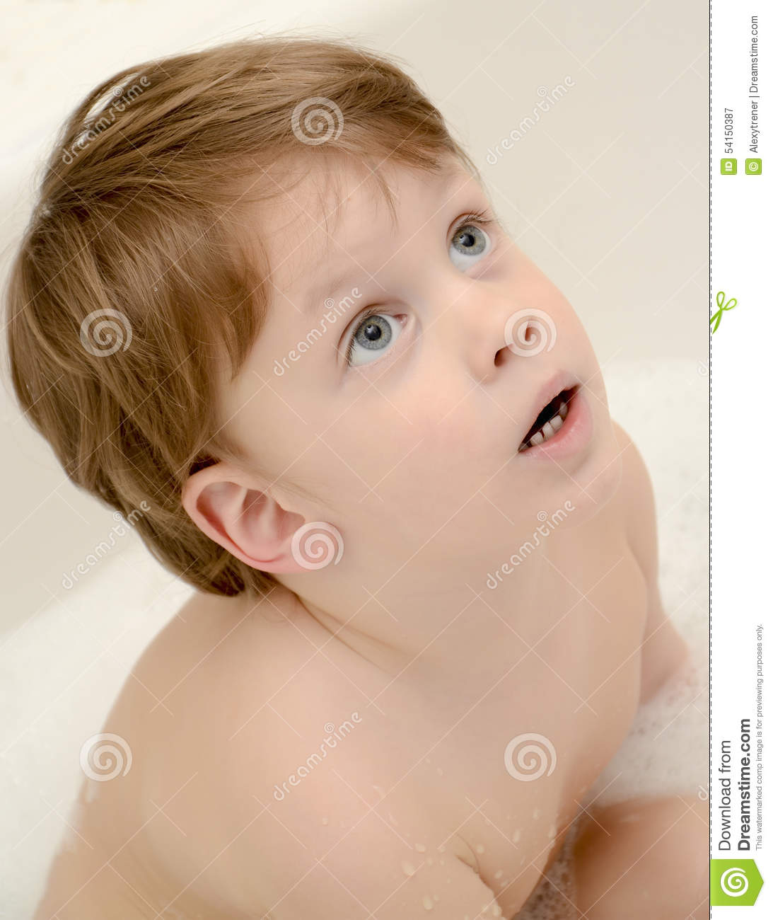 Cute Three Year Old Boy Taking A Bath With Foam