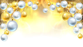 Gold And Silver Christmas Baubles Background Royalty Free Stock Images