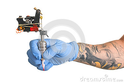 Stock Photo  Tattoo Artist At Work Isolated On White  Closeup
