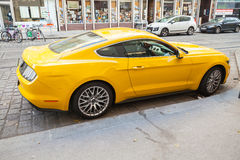 Yellow Ford Mustang 2015 Car Side View Stock Photo