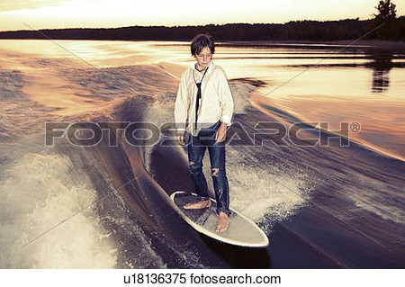 Boy Wakeboarding On Lake Greeson View Large Photo Image