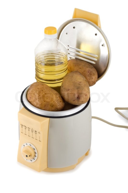 Potatoes Prepared In French Fries Machine Isolated On White Background